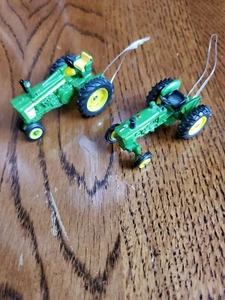 2X 1/64 John Deere Tractors. 1 narrow 1 wide  - Picture 1 of 5