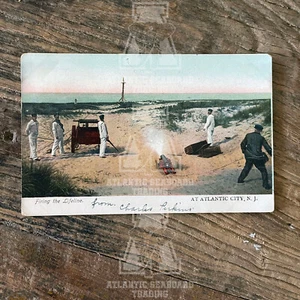 Carte postale ancienne 1906 - "Tir la ligne de vie, Atlantic City N.J." (New Jersey) - Photo 1/2