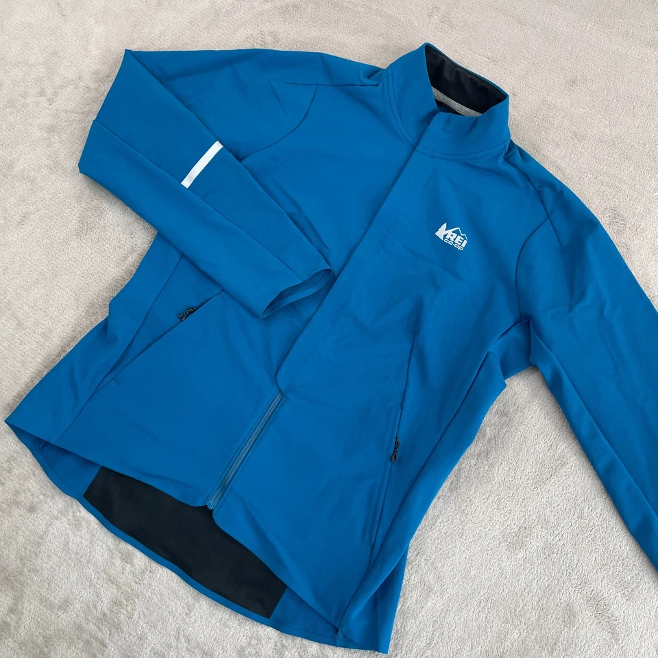 REI Co-op Junction Hybrid Cycling Jacket Men Medium Blue Performance NWOT - Image 1 of 4