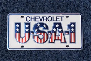 Vintage Small Hole USA-1 Chevy Promo Front License Plate Accessory Bowtie Dealer - Picture 1 of 8