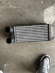 RADIADOR INTERCOOLER FORD FIESTA MK7 - AV219L440AB - Imagen 1 de 3
