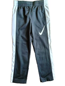 NIKE DRI FIT BOYS XS size 4 black / white ATHLETIC pant with strings NEW. - Picture 1 of 2