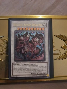 Yu-Gi-Oh! Atomschrottdrache STOR-E043 - Ultimate Rare - 1. Auflage - Bild 1 von 2