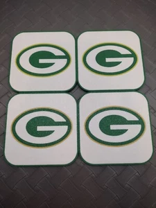 GREEN BAY PACKERS NFL DRINK COASTERS FOOTBALL 3.5" 0.2" SET 4 HEAT RESISTANT BAR - Picture 1 of 5