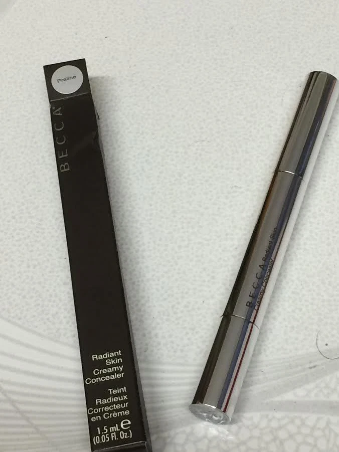 BECCA RADIANT SKIN CREAMY CONCEALER - PRALINE  - 0.05 OZ/1.5 ML - Image 1 of 1