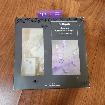 Pier 1 Importaciones Halloween Esqueleto Brillo Cuerdas LED 10' Púrpura Batería Luces Foto 1 de 4