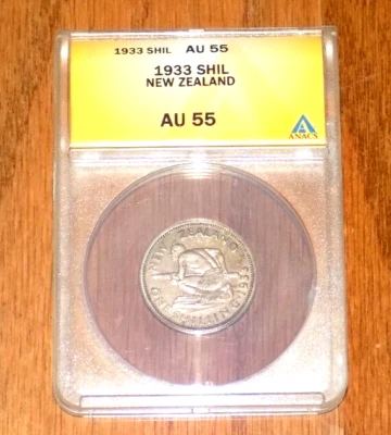 Moneda de Nueva Zelanda 1933 de un chelín Anacs certificado AU55 guerrero maorí graduado Nueva Zelanda Foto 1 de 4