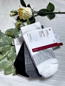 NWT$48 Lululemon Power Stride Crew Socks 3 Pack - WHT/HTRG/BLK - Size L - Picture 1 of 5