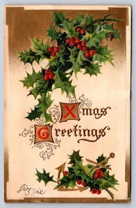 Antiguo B.B. Postal de Navidad de Londres en relieve acebo dorado saludos de Navidad - Imagen 1 de 2