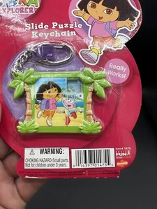 Vintage Schlüsselanhänger DORA the Explorer Slide Game Keychain Ring & Kette - NEU - Bild 1 von 3
