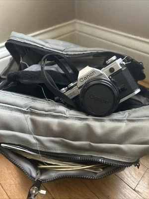Cannon AE-1 Camera With 3 Interchangeable Lenses Flash And Carrying Bag - Image 1 of 4