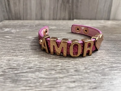 BCBG “AMOR” Pulsera Amor Letras Bronce BCBGeneration Foto 1 de 4