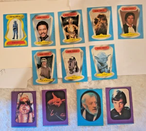 Lotto 12 adesivi 1980/83 TOPPS Star Wars EMPIRE STRIKES BACK OTTIME CONDIZIONI Luke-Han-Obi/altro - Foto 1 di 13