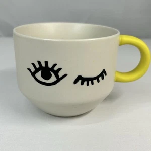 STARBUCKS WINKING EYE COFFEE CUP MUG 14OZ 2017 OFF WHITE YELLOW HANDLE EYELASHES - Picture 1 of 9