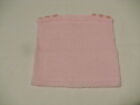 baby's hand-knitted garter-stitch edged slipover in pink to fit 1 - 2 yr old