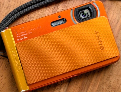 Japanese only Sony Cyber shot DSC-TX30 18.2MP 5x Zoom Digital Camera Orange JP - Image 1 of 4