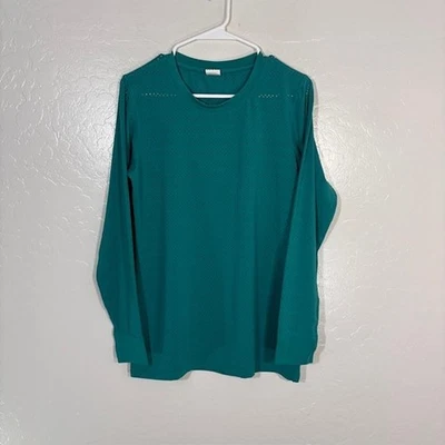 Camisa deportiva perforada Zyia Active para mujer verde azulado mediana manga larga Foto 1 de 4