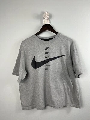NIKE Mujer CAMISETA Ropa Deportiva Swoosh Just Do It Camiseta Manga Corta Gris Mediana Foto 1 de 4