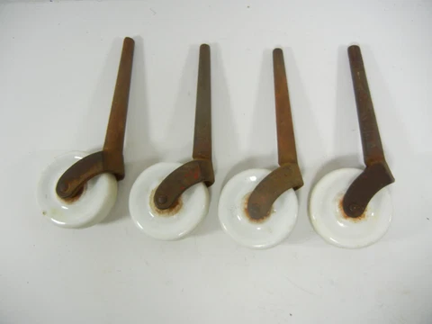 4 MATCHING VINTAGE BRASS MOUNT CERAMIC WHEEL CASTERS  1-3/4  INCH WHEELS K1398 Cover