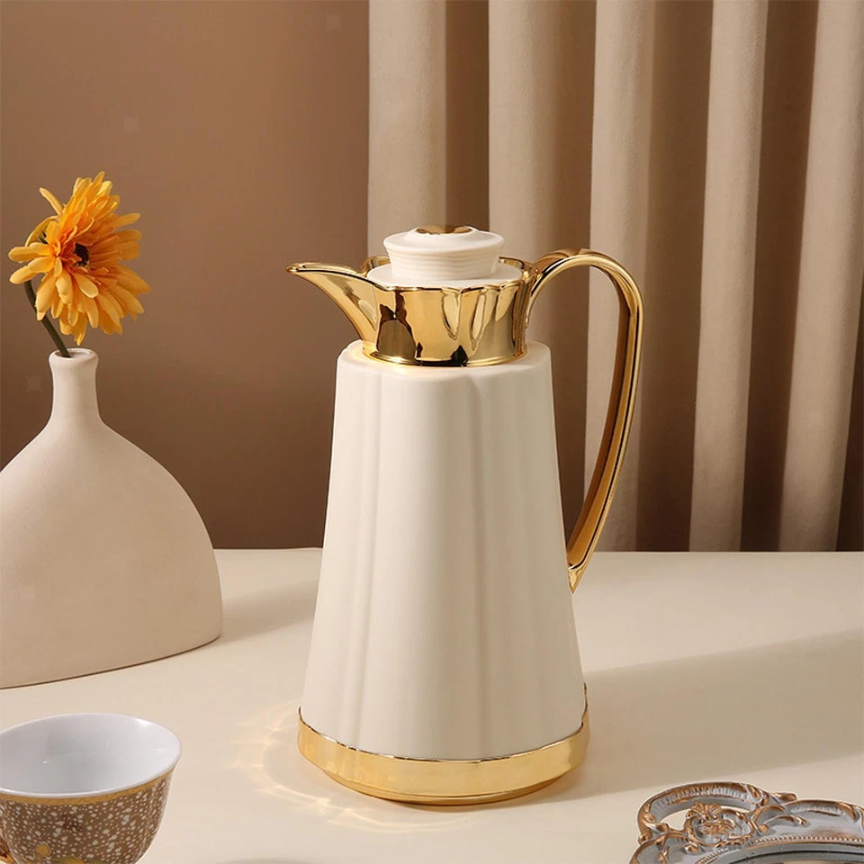 Tetera jarra de café térmica aislada árabe con caño revestimiento de vidrio agua caliente Foto 1 de 1