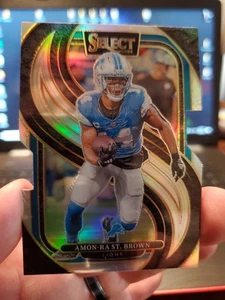 2024 Panini Select - Premier Level Amon-Ra St. Brown #105 Silver Prizm Die-Cut - Bild 1 von 8