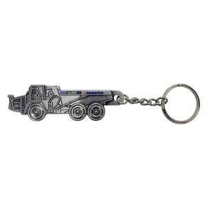 Komatsu HM400 Dump Truck Embossed Metal Keychain 90-0650 - Picture 1 of 3