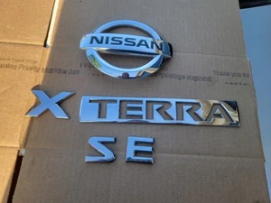 🔥05 06 07 08 09 10 11 12 NISSAN XTERRA SE Rear Trunk Emblem Logo Badge OEM - Picture 1 of 3