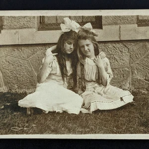 Antique Photo Girls With Long Hair Embracing Big Hair Bows Snapshot - Picture 1 of 5