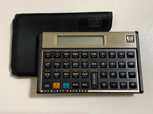 Calcolatrice finanziaria Hewlett Packard HP 12C colore oro con custodia, funziona vintage - Foto 1 di 10
