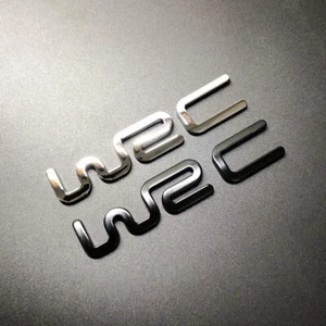 2 piezas Pegatina Emblemas Cromados Campeón del Mundo de Rallyes WRC Insignia Coche Tapa del Tronco - Imagen 1 de 11