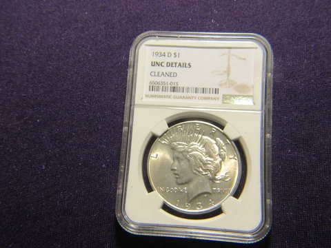 1934-D peace dollar NGC with UNC details cleaned Cover