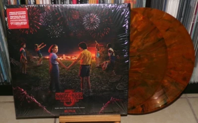 STRANGER THINGS 3 ORANGE & BLACK SPLATTER COLOR LP MATERIAL GIRL CAN'T FIGHT WHO - Image 1 of 4