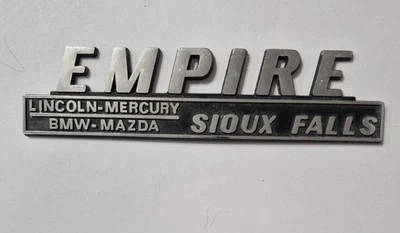 Etiqueta emblema vintage Empire Lincoln Mercury Mazda Sioux Falls metal revendedor  - Imagem 1 de 2