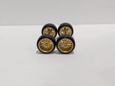 Rodas e pneus estilo piloto real ouro 15 raios escala 1:64 11 mm - Imagem 1 de 2