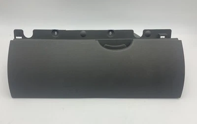 Guantera Nissan Xterra 2005-2011 gris tablero superior montaje OEM Foto 1 de 4