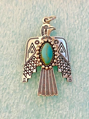 Nice silver Pewter 1" by 1.5" Thunderbird with blue faux turquoise Pedant charm - Image 1 of 3