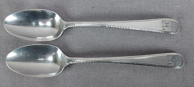 Par de cucharas de plata esterlina Stephen Adams I Londres siglo XVIII C.1770-1812 Foto 1 de 4