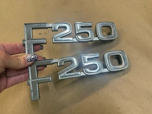 80-86 Ford Truck F250 Emblems Pair 1980-1986 OEM - Bild 1 von 4