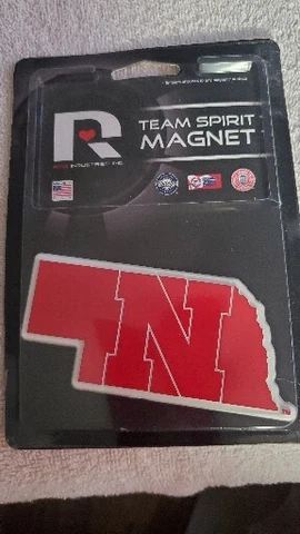 Nebraska Cornhuskers Team Spirit Magnet. 4" x 2"   - Officially Licensed College Cover