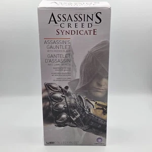 ASSASSINS CREED SYNDICATE ASSASSINS GUANTLET UBISOFT - NUOVO IN SCATOLA - Foto 1 di 5