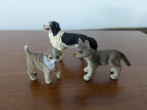 Schleich Trio of Dogs - Australian Shepherd puppy, Border Collie & Wolf Cub - Picture 1 of 5