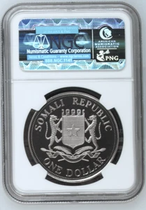 2006 SOMALI $1 YEAR OF THE DOG / COLLIE COLORED, GRADED NGC PF-67 UCAM - Picture 1 of 2