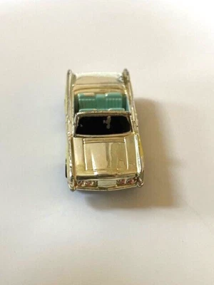 Micro Machines (1988) '65 Lincoln Continental Convertible, Yellow w/Silver - Image 1 of 2