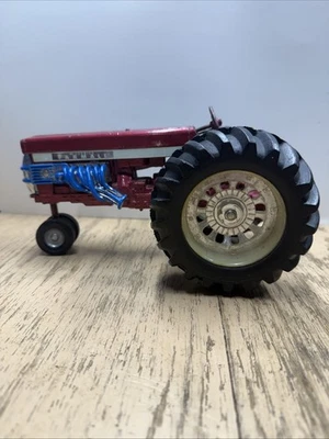 Tractor extractor de juguete de granja 1/16 Fly'n Farmall McCormick IH 560 Ertl de colección Foto 1 de 4