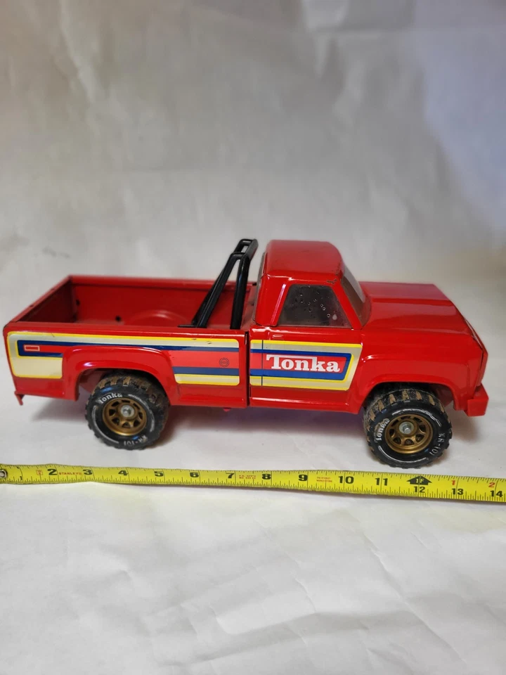 Camioneta pickup vintage Tonka de acero prensado roja #11062 años 80 rayas amarillas tintadas Foto 1 de 4