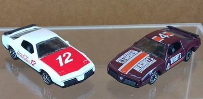 1982 Pontiac Firebird S/E: 2 Variations Coca-Cola + Hershey's - Corgi GT Britain - Image 1 of 4