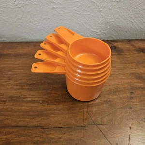 Juego de 5 tazas medidoras Tupperware vintage naranja tamaño 1/3-1 taza anidación de plástico - Imagen 1 de 13
