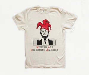 MORONS ARE GOVERNING AMERICA | ANTI MAGA ANTI TRUMP TEE | FIGHT FASCISM FTD TEE - Picture 1 of 9