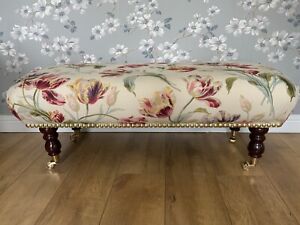 A new footstool in Laura Ashley gosford cranberry fabric