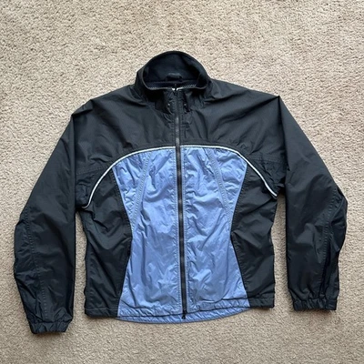 Cortavientos New Balance para mujer mediana cremallera completa cuello falso manga larga nailon Foto 1 de 4